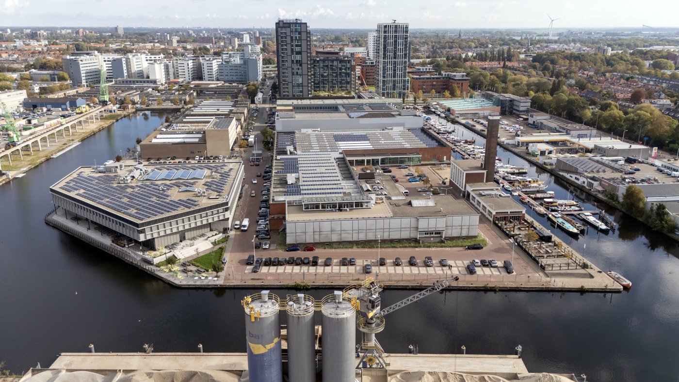 Aerial view of the Caballero Fabriek and Titaan with solar roofs along the Trekvliet
